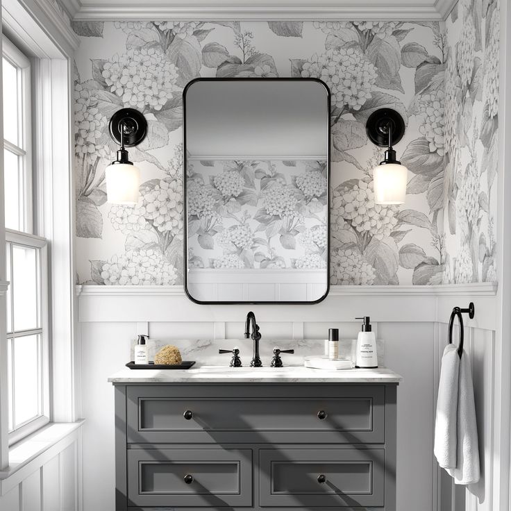 a bathroom vanity with two sinks and a large mirror above it, in front of a window