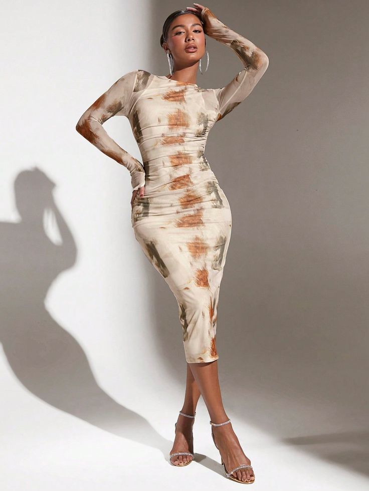 Discover a vibrant and bold addition to your wardrobe with our Radiant Rainbow Tie-Dye Bodycon Dress. Made with high-quality materials, this dress offers a flattering bodycon fit and a stunning tie-dye design. Perfect for any occasion, this dress will make you stand out in style. Color : Khaki Style : Elegant Pattern Type : Tie Dye Sleeve Length : Long Sleeve Neckline : Round Neck Details : Split Type : Bodycon Sleeve Type : Regular Sleeve Waist Line : Natural Hem Shaped : Pencil Length : Long Fit Type : Slim Fit Fabric : Medium Stretch Material : Knitted Fabric Composition : 94% Polyester Composition : 6% Elastane Care Instructions : Machine wash, do not dry clean,wash with the soft detergent Sheer : No Lining : 100% Polyester Size US Bicep Length Bust Cuff Hip Size Length Shoulder Sleeve Estilo Boho Chic, Khaki Fashion, Rainbow Tie, Tie Dye Designs, Tie And Dye, Long Style, Fabric Medium, Women Long Dresses, Estilo Boho