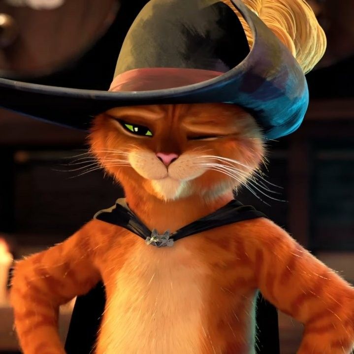 an animated cat wearing a witches hat