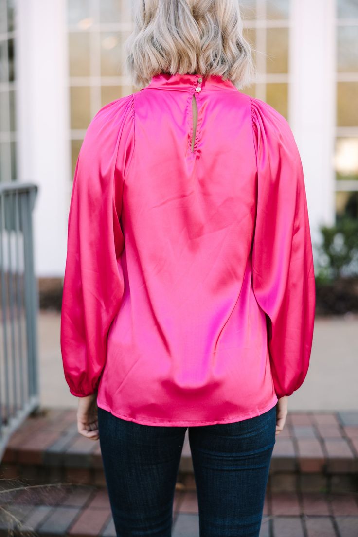 Embrace they joy that this blouse is going to bring! That satin fabric is so luxurious especially with that draped neckline! This bubble sleeve blouse is going to look amazing at the office or a nice restaurant! This blouse features long bubble sleeves, a draped cowl neck, a button keyhole back, and a sleek satin fabric. Material has no amount of stretch.Payton is wearing the small. Pink Satin Blouse, Nice Restaurant, Draped Neckline, Mint Julep Boutique, Bubble Sleeve, Satin Blouse, Fuchsia Pink, Tall Women, Pink Satin