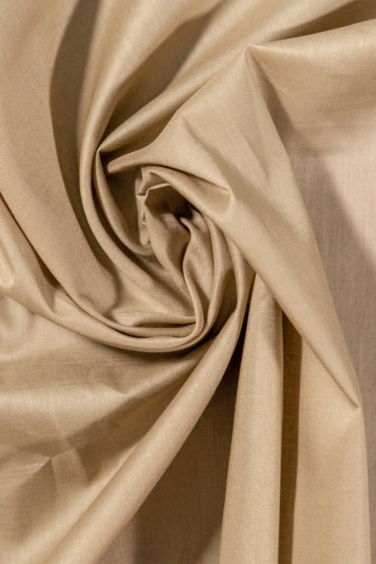 a close up view of a plain tan fabric