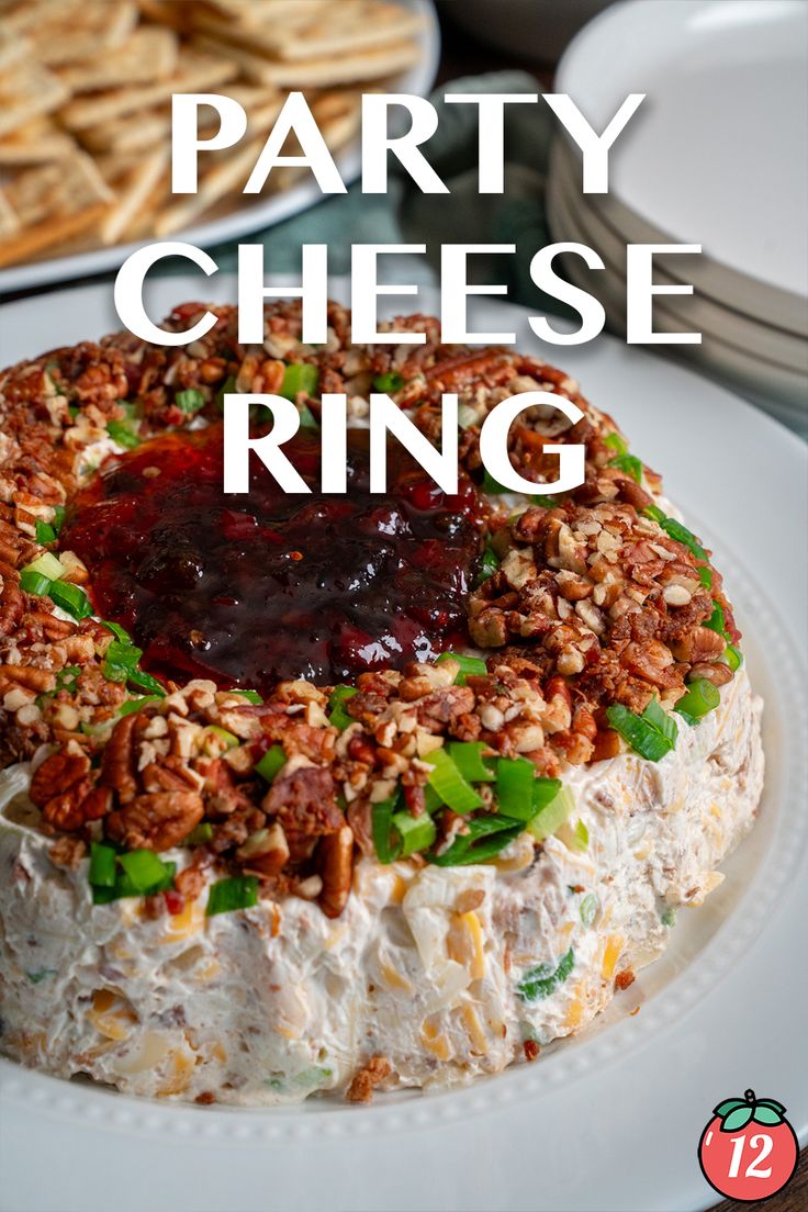 a party cheese ring on a plate with crackers