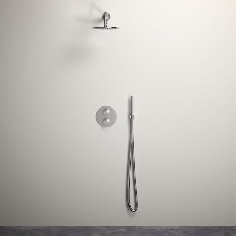 a shower head and hand shower in a white bathroom with grey flooring next to a wall mounted faucet