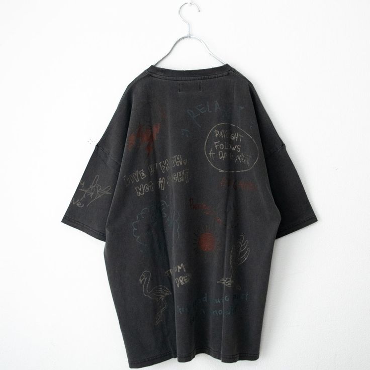 A popular series with graffiti-style designs.

 #graffiti #scribble #doodle


 M size: Length 71cm Width 60cm Shoulder width 62cm Sleeve length 21cm

 L size: Length 74cm Width 63cm Shoulder width 65cm Sleeve length 22cm


 ■ Country of Origin: China
 
■Material: Body: 100% cotton Casual Black T-shirt With Graffiti Print, Black Short Sleeve Top With Graffiti Print, Black Punk Style Top With Graffiti Print, Black Punk Tops With Graffiti Print, Black Punk Top With Graffiti Print, Black Hip Hop Top With Graffiti Print, Washed Black Graphic Tee With Graffiti Print, Black Tops With Graffiti Print And Relaxed Fit, Oversized Black T-shirt With Graffiti Print