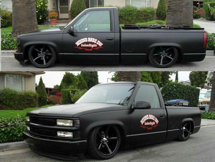 two pictures of a black truck with red and white decals on it's side