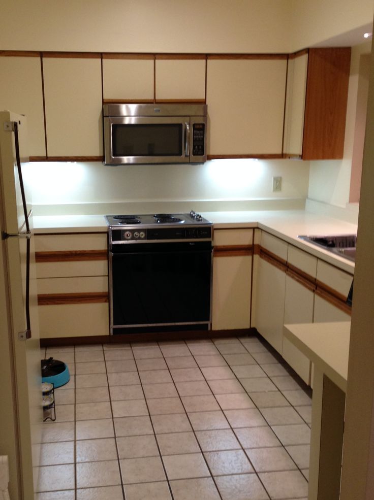 the kitchen is clean and ready for us to use in its new owner's home