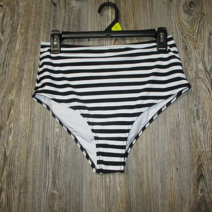 New Womens Size Large Cupshe Black And White Striped Bikini Bottom. The Shell Is 80% Nylon And 20% Spandex. The Lining Is 90% Polyester And 10% Spandex. Please See Attached Pictures For Measurements. If You Have Any Questions Let Me Know. Striped Bottoms For Sunbathing In Summer, Summer Striped Stretch Tankini, Striped Stretch Summer Tankini, Summer Swimming Bottoms With Lined Body, Summer High Waist Lined Swimwear, Lined High Waist Swimwear For Summer, High Waist Lined Swimwear For Summer, Lined Bottoms For Swimming In Summer, Black High Waist Swimwear For Summer