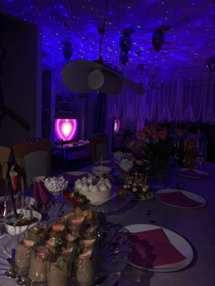 a table is set up with desserts and drinks for a party or special occasion