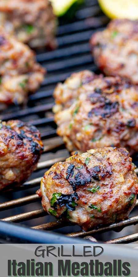 grilled meatballs on the grill with lemon wedges