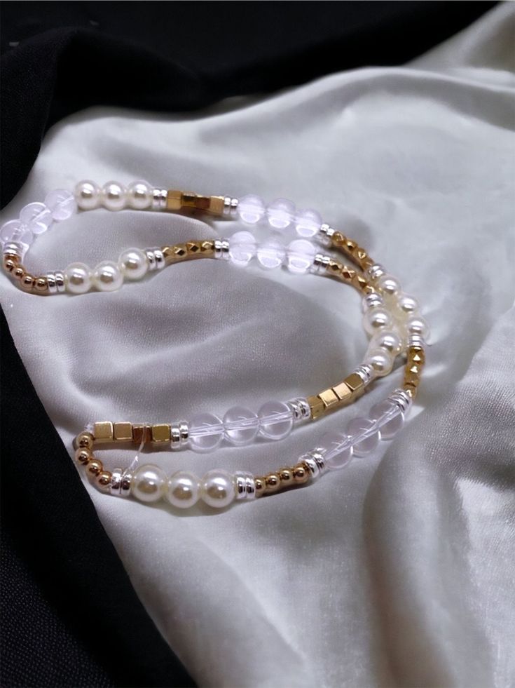 What material are the beads? -recycled metals gold beads -clear quartz beads -pearl beads Can I wear it in water? Not recommended.  When was it made? Jewelry is made to order so the beads are always fresh and new! Check us out at: WWW.WOOLANDPEPPERCO.COM WWW.INSTAGRAM.COM/WOOLANDPEPPERCO Gold Pearl Beaded Necklaces With Spacer Beads, Gold Pearl Beaded Chain Beads, Gold Pearl Beaded Chain, Gold Pearl Beads For Gift, Beaded Phone Lanyard, Phone Plug, Phone Lanyard, Made Jewelry, Quartz Beads