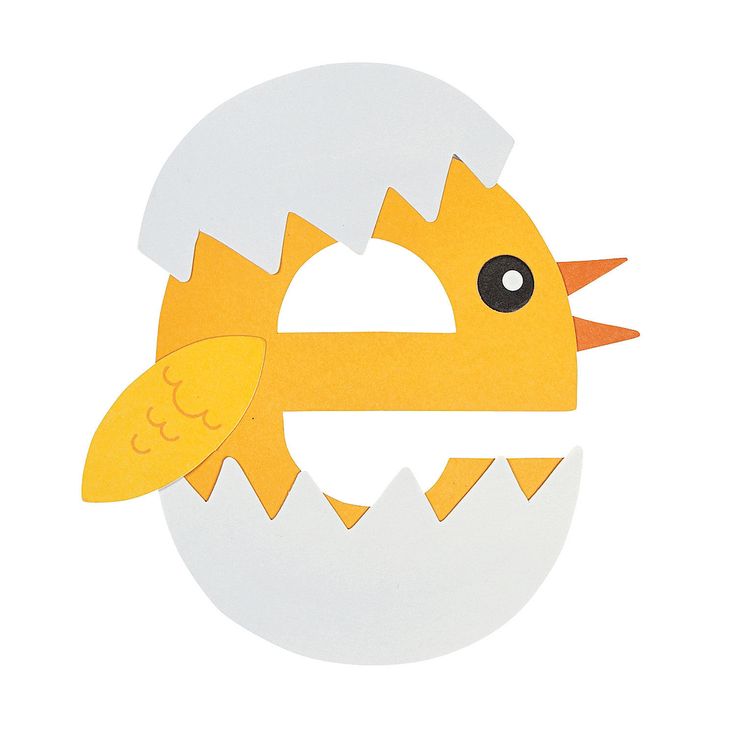 a paper cut out of an egg with a bird on it