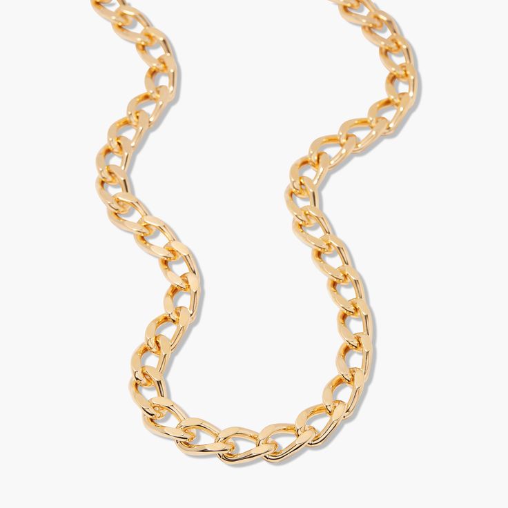 The Gigi Necklace is a classic statement piece with a unique twist. Our special curb chain and luxurious gold accents make it a timeless piece that will elevate your look and add the perfect finishing touch. Where will you take this necklace? Will it become your go-to accessory? Let its beauty adorn you and make you feel like a million bucks. Available in 14k gold plated brass Chain width: 3/8" 18" curb chain Lobster claw closure SKU: BYN1212 Trendy Gold Plated Chain Necklace For Formal Events, Trendy Gold Plated Chain Necklace For Formal Occasions, Classic Figaro Chain Metal Necklace, Classic Gold Metal Chain Necklace, Trendy Yellow Gold Chain Necklace For Formal Occasions, Trendy Formal Yellow Gold Chain Necklace, Elegant Yellow Gold Necklaces With Chain Strap, Classic Metal Necklace With Figaro Chain, Elegant Gold-tone Cuban Link Necklace