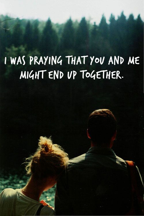 a man and woman sitting next to each other with the words i was praying that you and me might end up together