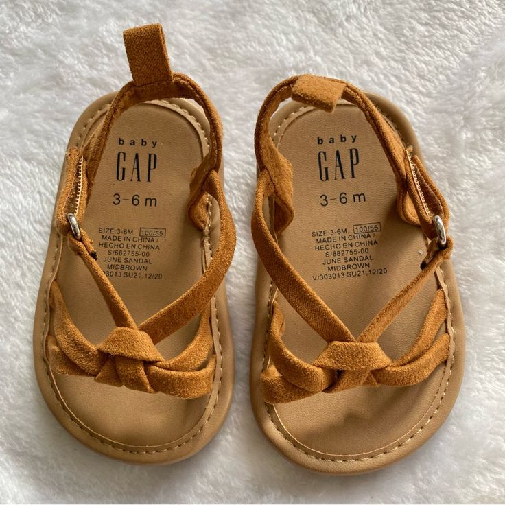 Gap Baby Sandals. Size 3-6 Months. Brown/Tan Baby Sandals. Velcro Straps. Excellent Condition. New Without Tags. Never Worn. Casual Brown Sandals For Playtime, Brown Sandals For Playtime In Spring, Brown Sandals With Soft Sole For Beach, Brown Beach Sandals With Soft Sole, Cute Brown Summer Sandals, Cute Brown Sandals For Spring, Gap Sandals With Round Toe For Spring, Casual Gap Sandals For The Beach, Gap Open Toe Sandals For Spring