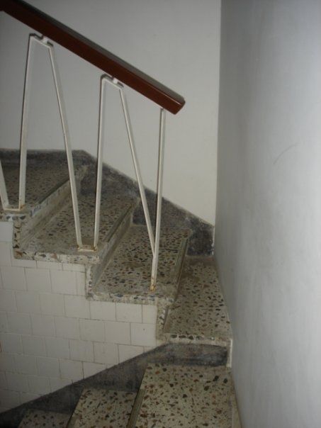 an image of a stair case going up the stairs