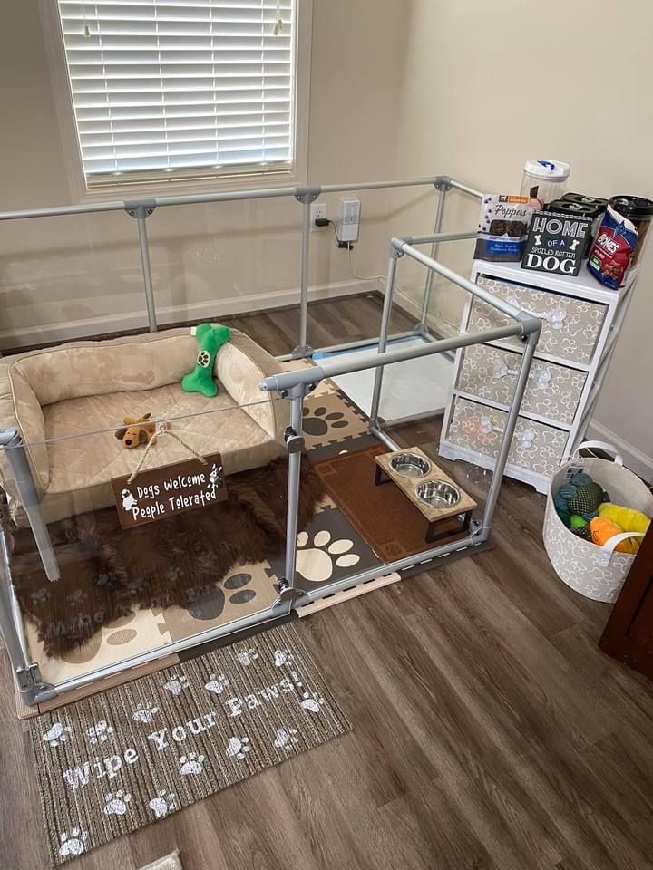 a dog's kennel is shown in the living room