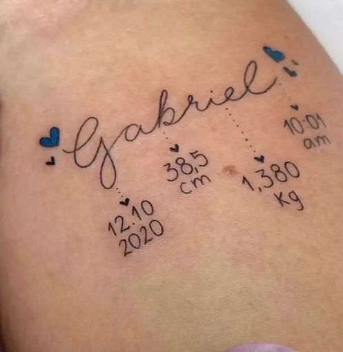 a tattoo with the name and date on it