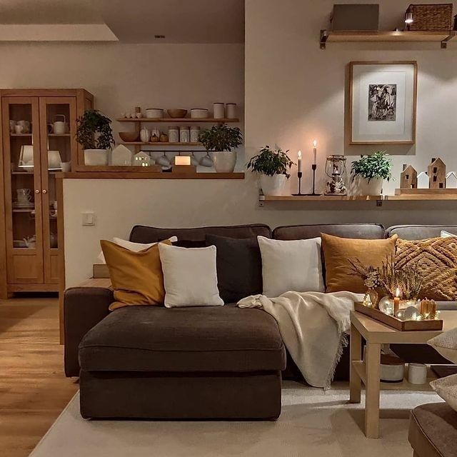 a living room filled with furniture and decor