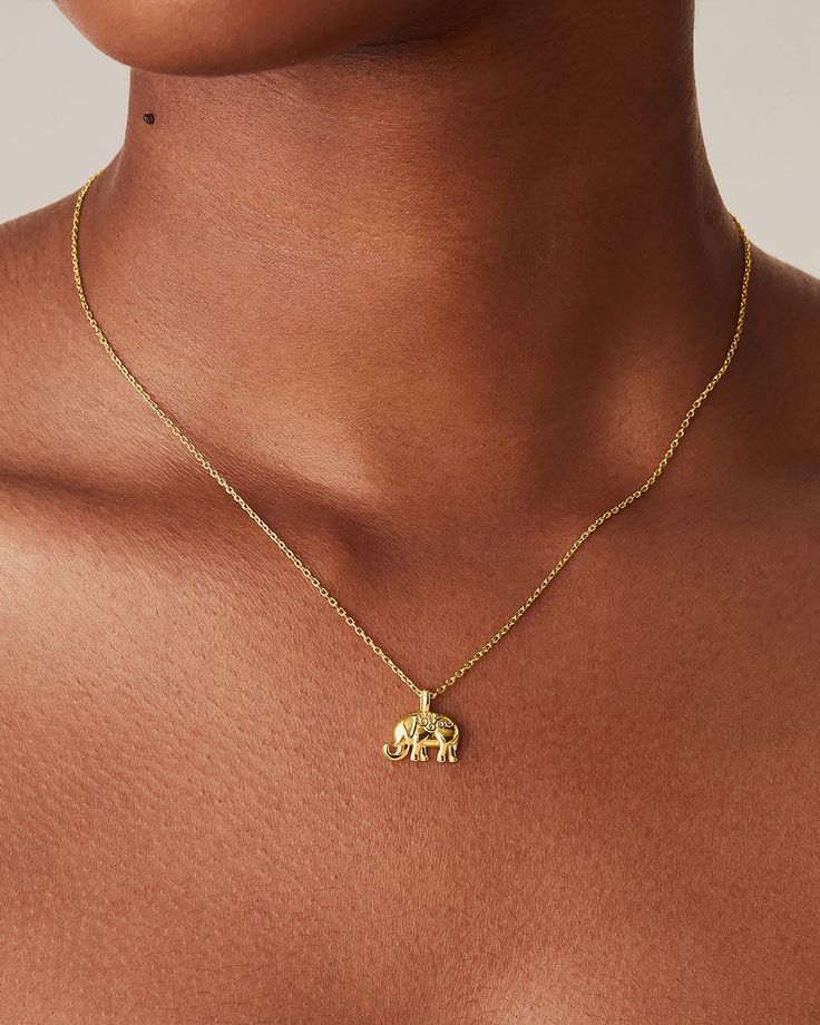 This dainty Elephant Pendant Necklace is perfectly understated—and ideal for everyday wear.Materials: 14K yellow, rose or white gold plated Measurements: Length: 19" Slider chain Elephant Pendant: 14mm x 13.3mm Elephant Pendant Necklace, Elephant Necklace, Elephant Pendant, Goldfish, Yellow Rose, Gold Plate, Everyday Wear, Elephant, White Gold