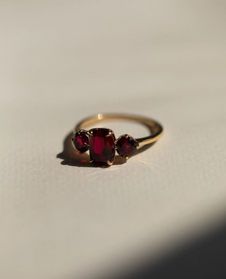 Red Ruby Diamond Ring, Three Stone Gemstone Ring, Elongated Cushion & Round Cut Engagement Ring, Past Present Future Wedding Ring, 14K Gold Item Description: Stone - Simulant Diamond Stone Shape - Elongated Cushion & Round Cut 1. White Gold: 10K/14K/18K 2. Yellow Gold: 10K/14K/18K 3. Rose Gold: 10K/14K/18K 4. Silver: Sterling Silver 925 Size Customization: What Size you want... * You can also Customize ring size in US 4 to US 12! It sometimes affects to price. * Main Stone & Shape Customization: Luxury Dainty Round Ruby Ring, Antique Ring Round Stone, Antique Ruby Ring Stone, Raw Ruby Engagement Rings, Engagement Ring With Small Ruby, Solid Gold Rings With Stone, Vintage Gold Rings Rose, Big Stone Rings Simple, Deep Set Stone Ring