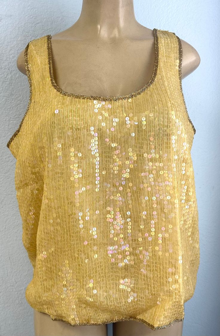 This sequin top is handmade, high quality, original design and beautiful. This top is suitable for party, events or any occasional use. Gold Top For Spring Party, Gold Party Top For Spring, Stretch Sequin Fabric For Summer Parties, Spring Party Stretch Sequin Fabric, Disco Party Top With Contrast Sequin, Disco Style Sleeveless Evening Tops, Disco Holiday Tops For Evening, Glamorous Sequined Tank Top For Parties, Sequined Sleeveless Tank Top For Party