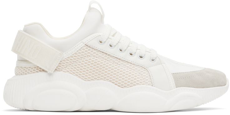 Low-top calfskin suede, mesh, and stretch jersey sneakers in white. · Reflective logo-woven trim throughout · Lace-up closure · Pull-loop at tongue · Padded sock-style collar · Logo-woven velcro strap at heel · Sculptural rubber midsole · Treaded rubber sole Supplier color: White Sock Style, Moschino Men, Sole Sneakers, Latest Sneakers, Fashion Socks, Velcro Straps, White Shoes, Sneakers White, Sneakers Black