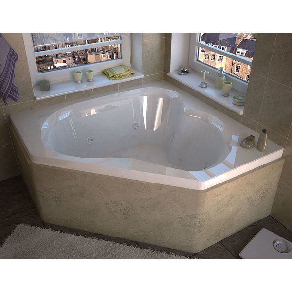 a bathroom with a large jacuzzi tub in it