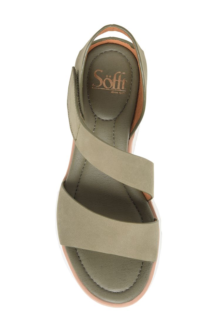 A sporty sole provides traction in this modern sandal outfitted with a cushioned footbed and leather straps. 2 1/4" heel; 1" platform Adjustable hook-and-loop strap Cushioned footbed Leather upper and lining/rubber and synthetic sole Imported Sporty Sandals With Cushioned Footbed And Double Strap, Spring Double Strap Cushioned Wedge Sandals, Spring Double Strap Wedge Sandals With Cushioned Footbed, Casual Double Strap Sport Sandals With Removable Insole, Spring Double Strap Footbed Sandals With Arch Support, Casual Double Strap Sport Sandals With Cushioned Footbed, Casual Sport Sandals With Cushioned Double Strap, Spring Footbed Sandals With Arch Support And Double Strap, Summer Sport Sandals With Ortholite Insole And Ankle Strap