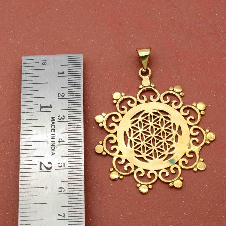 Product:- Pendant Material:- Brass Gold Mandala Necklace Flower Of Life Sacred Geometry Pendant Bohemian Necklace Boho Necklace,Ethnic Jewellery tribal pendant,brass necklace ❥ Customers' satisfaction is our biggest priority, please contact us with any questions/queries for future or existing orders, and we will do our best to make sure you are happy with your order. ❥Please make sure to add the correct address during checkout. You can return your purchased item within 15 days after successful d Brass Pendant Jewelry For Festivals, Bohemian Gold Locket Necklace, Bohemian Gold Jewelry With Copper, Gold Jewelry With Large Pendant For Festival, Bohemian Gold Medallion Jewelry, Brass Locket Jewelry For Festivals, Antique Gold Round Pendant Bohemian Jewelry, Traditional Brass Nickel-free Necklace, Antique Gold Bohemian Necklace Nickel Free