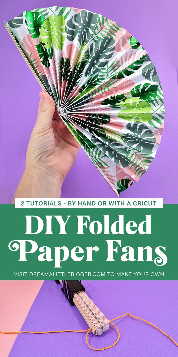 a hand holding a paper fan with text overlay that reads, diy folded paper fans