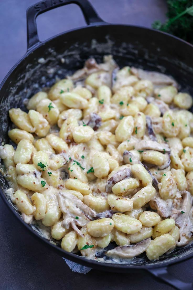 a skillet filled with macaroni and cheese