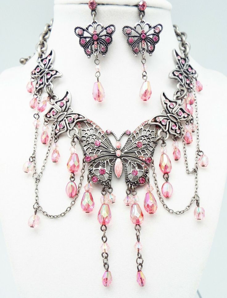 DESIGNER INSPIRED BOUTIQUE  17 in PINK A/B MULTI CRYSTAL  ENAMEL MULTI BUTTERFLY JEWELERY SET NEW Up for your consideration is a PINK multi crystal unique filigree Multi Butterfly Necklace and Earrings Jewelry Set. ALL SET IN SILVER-TONE METAL Butterfly Necklace measures 13 in with a 4 in metal center station Butterfly 3 1/2 in by 2 in with crystal drops French Wire Hook pierced Earrings measure 2 in by just under  1 in Great gift Idea. Please ask all questions prior to ordering! Butterfly Necklace And Earrings, Serah Farron, Gothic Jewelry Diy, Otherworldly Beauty, Outfit Pieces, Grunge Accessories, Fairy Jewelry, Metal Butterfly, Valentines Wallpaper