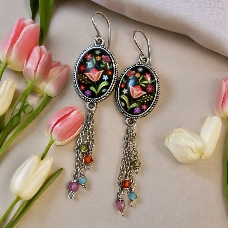 Boho Earrings!  I repurposed beautiful floral connectors from a bracelet for the focal pieces! Dangling beneath are Peridot, Carnelian, Dyed Quartz, and glass crystals!  I love incorporating nature in my designs! These bring me English Garden vibes! 💐 Bohemian Czech Glass Dangle Flower Earrings, Vintage Multicolor Czech Glass Earrings, Hand Painted Metal Dangle Jewelry, Bohemian Nickel-free Flower Earrings For Jewelry Making, Bohemian Czech Glass Flower Earrings, Multicolor Bohemian Nickel-free Flower Earrings, Bohemian Hand Painted Metal Jewelry, Bohemian Flower Czech Glass Earrings, Bohemian Earrings As Gift