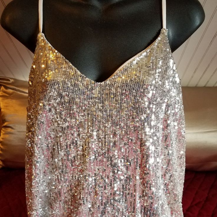 Express Silver Large Camisole Glamorous Sleeveless Top With Built-in Bra, Glamorous Tank Top For Night Out In Spring, Spring Party Camisole Vest, Spring Party Tank Top, Glamorous Summer Vest Top, Glamorous Spring Vest For Night Out, Summer Party Vest With Tank Straps, Glamorous Sleeveless Vest For Spring, Summer Sequin Camisole Tank Top