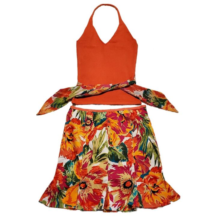 Bandolino Tropical Floral Skirt Set New With Tags Stretchy Coral Halter Top With Scarf Tie That Matches Skirt Size Ps Approx. Measurements: Pit To Pit Flat 14", Length 19" Material - 53% Silk, 28% Nylon, 19% Cotton Floral Mini Skirt With Ruffle Size 10p Approx. Measurements: Waist 30", Length 19" Material - 97% Cotton, 3% Spandex Side Zip Orange Floral Print Skirt, Orange Skirt For Summer Vacation, Orange Skirted Skort For Spring, Spring Orange Skirted Skort, Fitted Floral Print Skort For Vacation, Orange Floral Print Skirt For Day Out, Orange Skort For Summer, Summer Orange Skirt For Vacation, Orange Cotton Skirt For Day Out