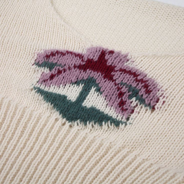 Introducing the Maiya Palm Knit Sweater, a perfect blend of cozy comfort and playful style. Crafted from soft, high-quality knit fabric, this sweater offers a snug fit that flatters your figure while keeping you warm. The standout feature is the charming palm tree design embroidered on the front, adding a touch of whimsy to your everyday look. The off-white color makes it versatile, easy to pair with your favorite jeans or skirts for a chic, laid-back ensemble. With its long sleeves and subtle s Comfortable White Fall Sweater, Trendy Cozy White Sweater, Trendy White Comfortable Sweater, Comfortable White Sweater For Fall, Cozy White Trendy Sweater, White Cozy Fit Trendy Sweater, Trendy White Cozy Fit Sweater, White Knit Sweater For Layering, Cozy White Cotton Sweater