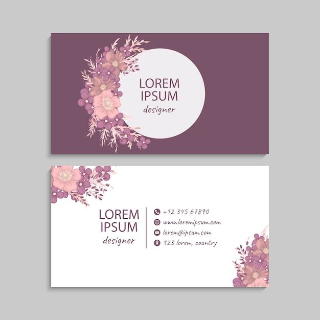 two business cards with pink flowers on the front and back, one is white and purple