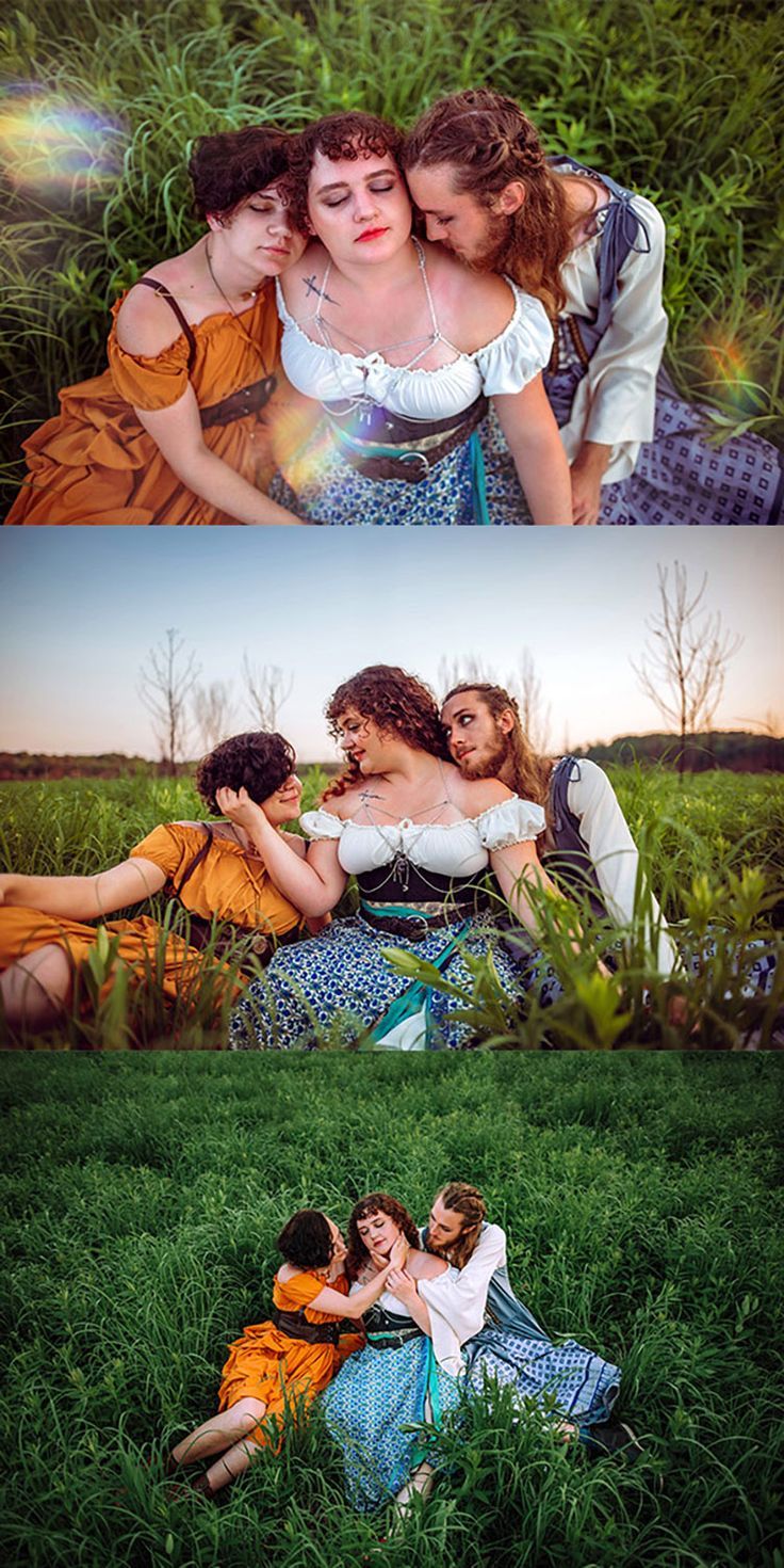 three women are sitting in the grass with their arms around each other and one woman is hugging