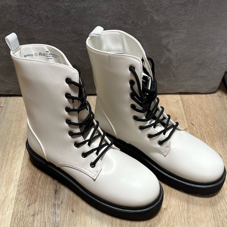 This Is A Cute Pair Of White Military Style Boots. They Have Just Been Sitting In My Closet And Never Been Worn Except To Try On. Thanks For Looking! Spring Combat Boots With Laces And Round Toe, Casual Combat Boots With Round Toe For Spring, Casual Cream Lace-up Boots For Winter, Casual White Combat Boots For Spring, Beige Casual Combat Boots For Spring, Casual Beige Combat Boots For Spring, White Casual Lace-up Combat Boots, Military Style Boots, Military Boots