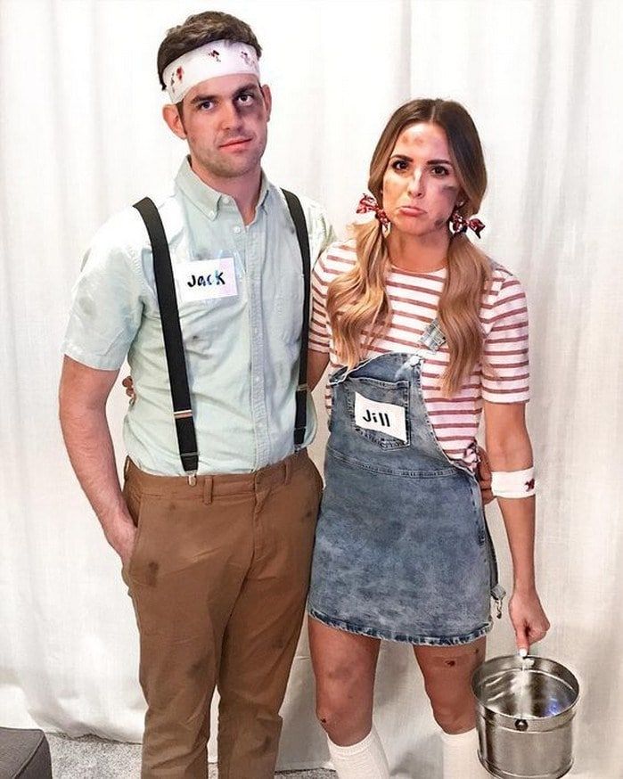 a man and woman dressed up in costumes