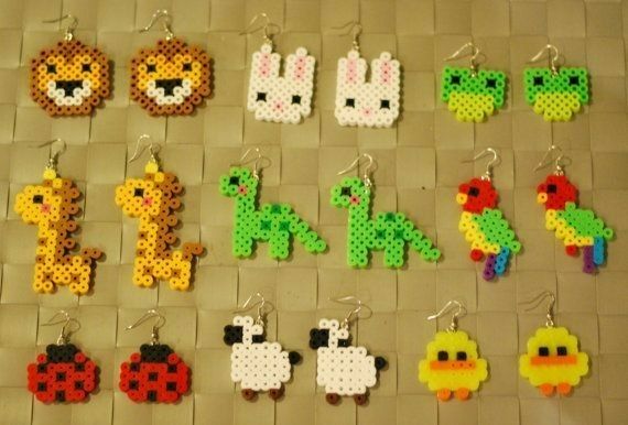 several different types of beaded animal earrings