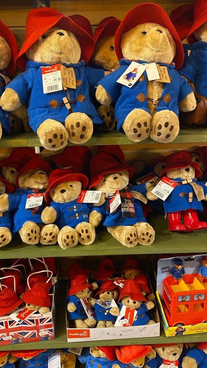 several teddy bears are on display in a store