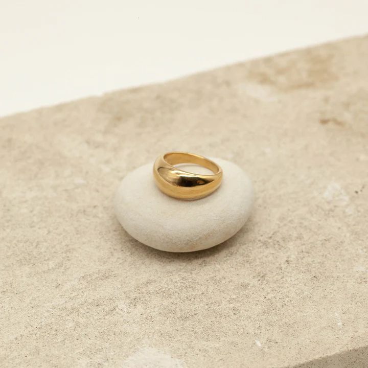 USE CODE THE FOLLOWING CODE TO RECIEVE 15% OFF: UGCARTISTRY15. The Agnes is a bold ring that is sure to be noticed. Pair with contrasting metals, finer pieces or wear as a statement piece. Plating: 14k Gold Materials: 14k Gold on Stainless Steel Hypoallergenic Gold Open Dome Ring In Recycled Gold, Classic Wide Band Open Ring, Tarnish Resistant, Classic Tarnish Resistant Wide Band Open Ring, Fine Jewelry Brass Open Ring, Brass Open Ring Fine Jewelry, Brass Dome Ring With Polished Finish And Open Design, Modern Gold Wide Band Open Ring, Polished Brass Dome Ring With Open Design, Tarnish Resistant Brass Open Ring