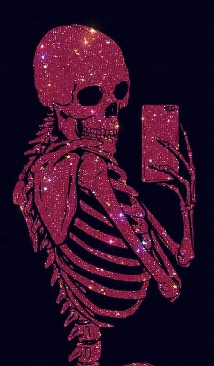 a skeleton holding a cell phone in its hand