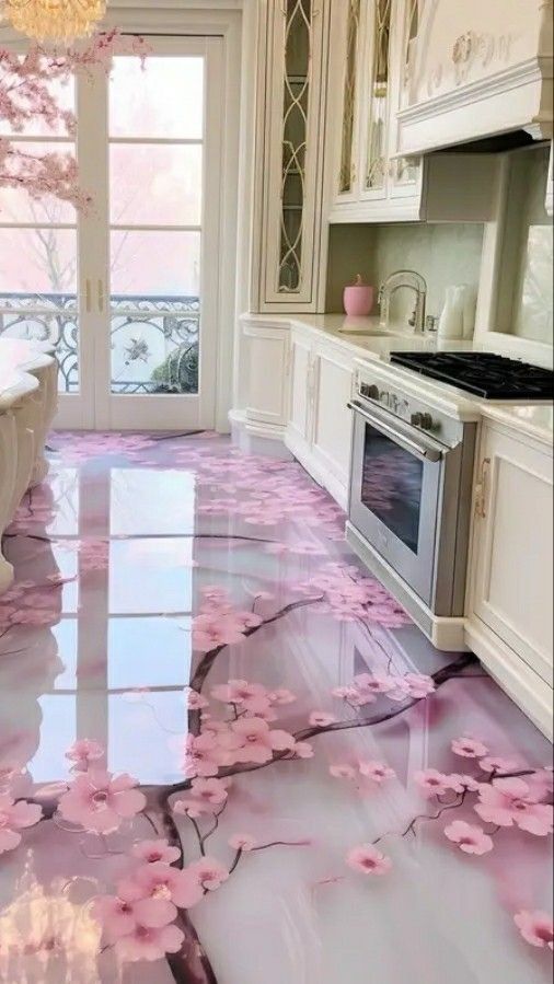 a kitchen with pink flowers on the floor