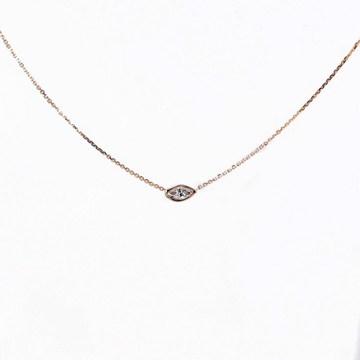 This necklace is one of my very first designs, and one of the very few necklaces that goes well with any layered set. Featuring a 14k gold Marquis cut diamond necklace. ---------------D E T A I L S--------------- - .15 ct Marquis cut diamond, G SI+ - Measures approximately 4.5 mm x 2.5 mm - Wrapped in 14k gold - 14k gold cable chain with a spring ring clasp, 0.5 mm - Available in 14k white, yellow or rose gold - Sizes 15 - 20 inches *18k gold and custom sizes are available upon request Luxury Marquise Necklace With Single Diamond, Luxury Single Diamond Marquise Necklaces, Luxury Marquise Single Diamond Necklace, Yellow Gold Marquise Necklace With Single Diamond, Luxury Marquise Necklace For Gift, Fine Jewelry Marquise Diamond Necklace With Single Cut Diamonds, Fine Jewelry Diamond Necklace With Marquise Single Cut Diamonds, Dainty 14k Gold Diamond Pendant Necklace, Oval Single Cut Diamond Necklaces As Gift