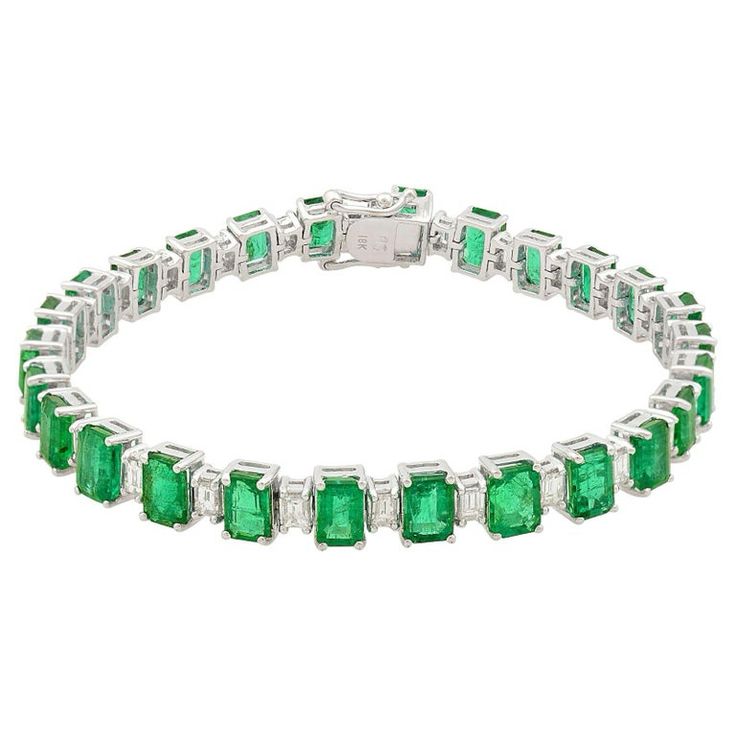 Check out this item from 1stdibs! 14.80 Carat Emerald 2.25 Carat Diamond 14 Karat Gold Tennis Bracelet: https://www.1stdibs.com/id-j_14413382 Luxury Emerald Cut Tennis Bracelet With 17 Jewels, Luxury Green Diamond Bracelet Hand Set, Luxury Green Hand Set Diamond Bracelet, Classic Emerald-cut Emerald Bracelet, Luxury Green Brilliant Cut Diamond Bracelet, Formal Emerald Diamond Bracelet With Brilliant Cut, Emerald-cut Green Tennis Bracelet For Formal Occasions, Emerald Cut Green Tennis Bracelet For Formal Events, Green Diamond Bracelet For Formal Occasions