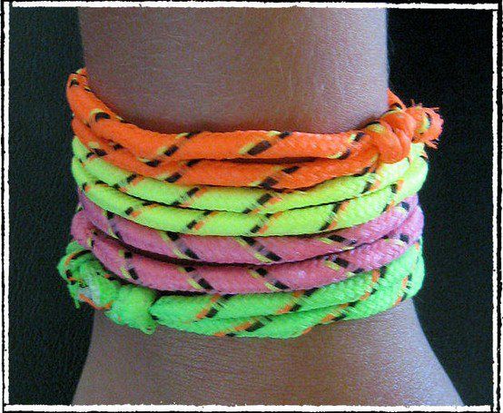 neon bracelets are stacked on top of each other