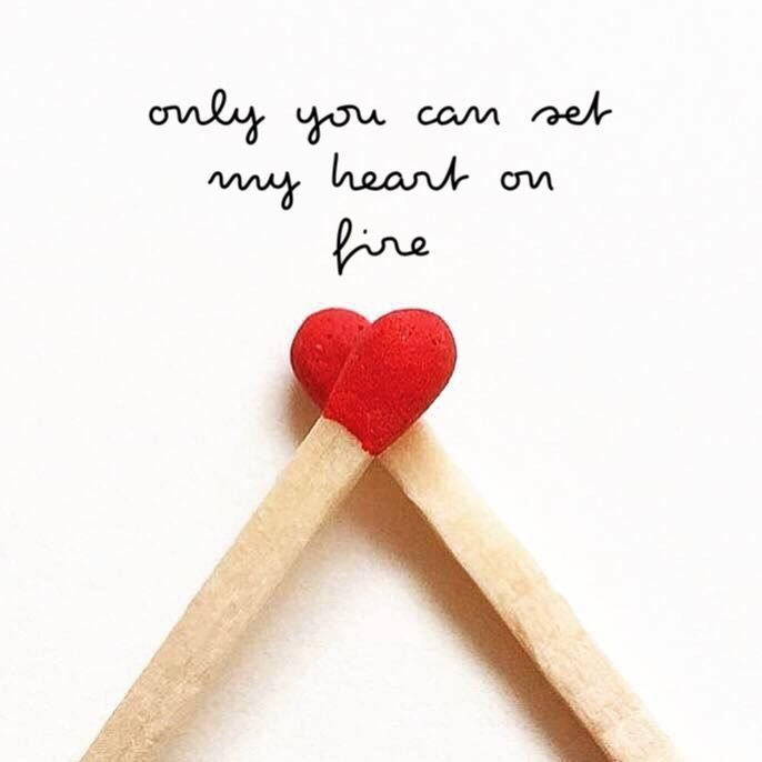 two matches with a red heart on them and the words only you can set my heart on fire