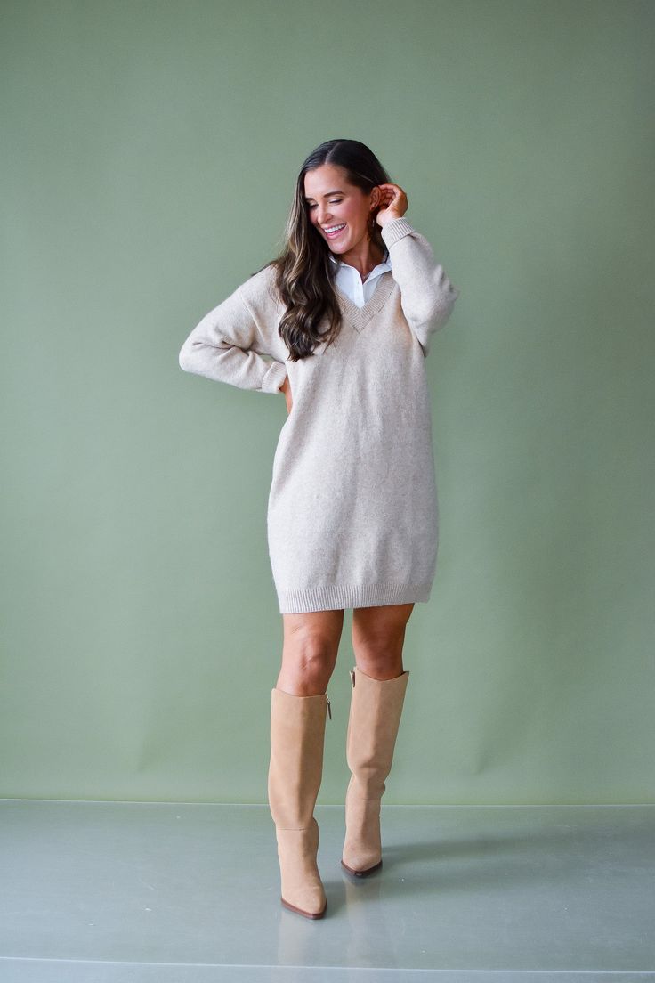 "Be both classic and chic in our Kirsten Sweater Dress - a cozy layered look with a peek of a white button down. Made from super soft fabric, this dress pairs perfectly with tall boots or flats. Perfect for any occasion! Product Details: Measurements: BUST : small 20” medium 21” large 21.5” LENGTH : small 32” medium 33” large 34” 74% acrylic 22% polyester 4% spandex faux button down layer long sleeves true to size model wearing size small model stats: size 4, 5'4 Elegant Fall Sweater Dress For Day Out, Cream Dress For Day Out In Fall, Cream Dresses For Fall Day Out, Cream Dresses For Day Out In Fall, Elegant Neutral Sweater Dress For Fall, Classic Beige Winter Dresses, Classic Long Sleeve Sweater Dress For Fall, Winter Beige Mini Dress For Day Out, Cream Knee-length Mini Dress For Fall